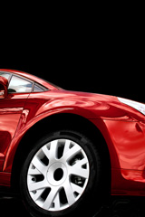 car wheel on a red sports car